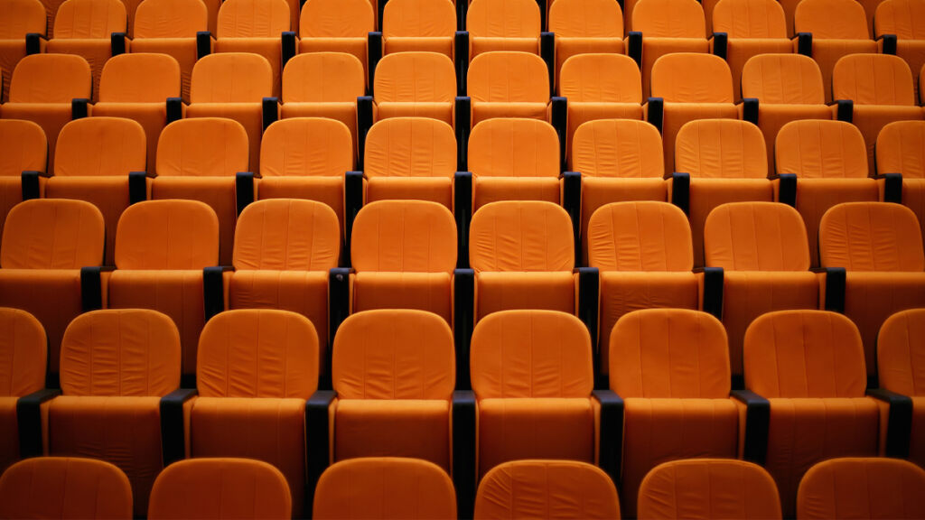 Rows of orange seats