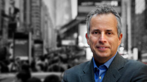 Allen Adamson with a black and white city background